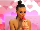 Hot Chick Deepthroats Pink Dildo on Webcam